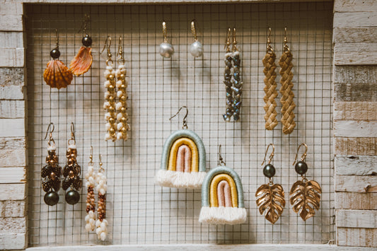 close up shot of variety of earrings.