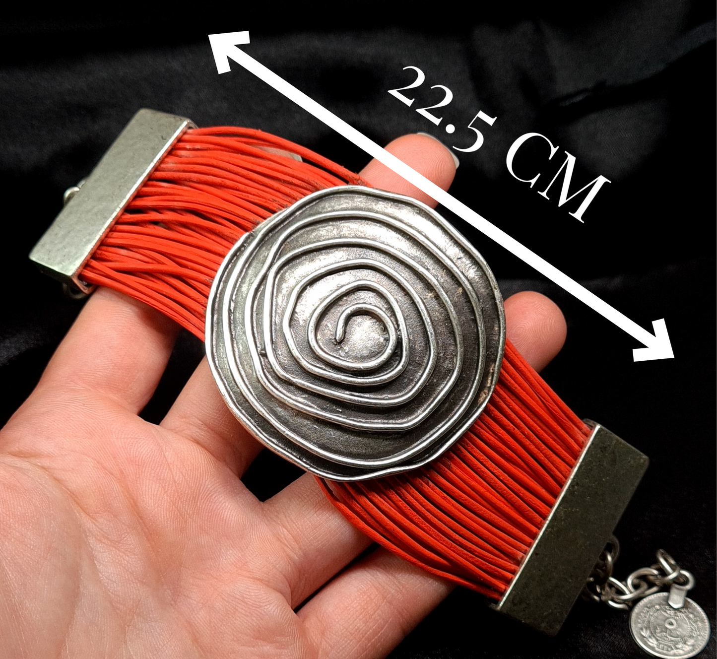 Brigitta Bracelet a silver bracelet with red leather straps