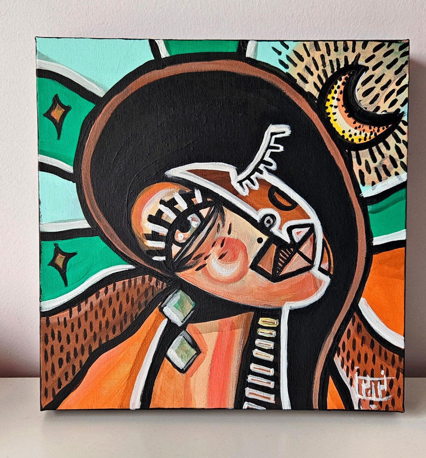 Abstract painting titled Starlit Desert Muse Painting featuring a stylized figure with a serene expression, surrounded by earthy tones, vibrant greens, a crescent moon, and star motifs