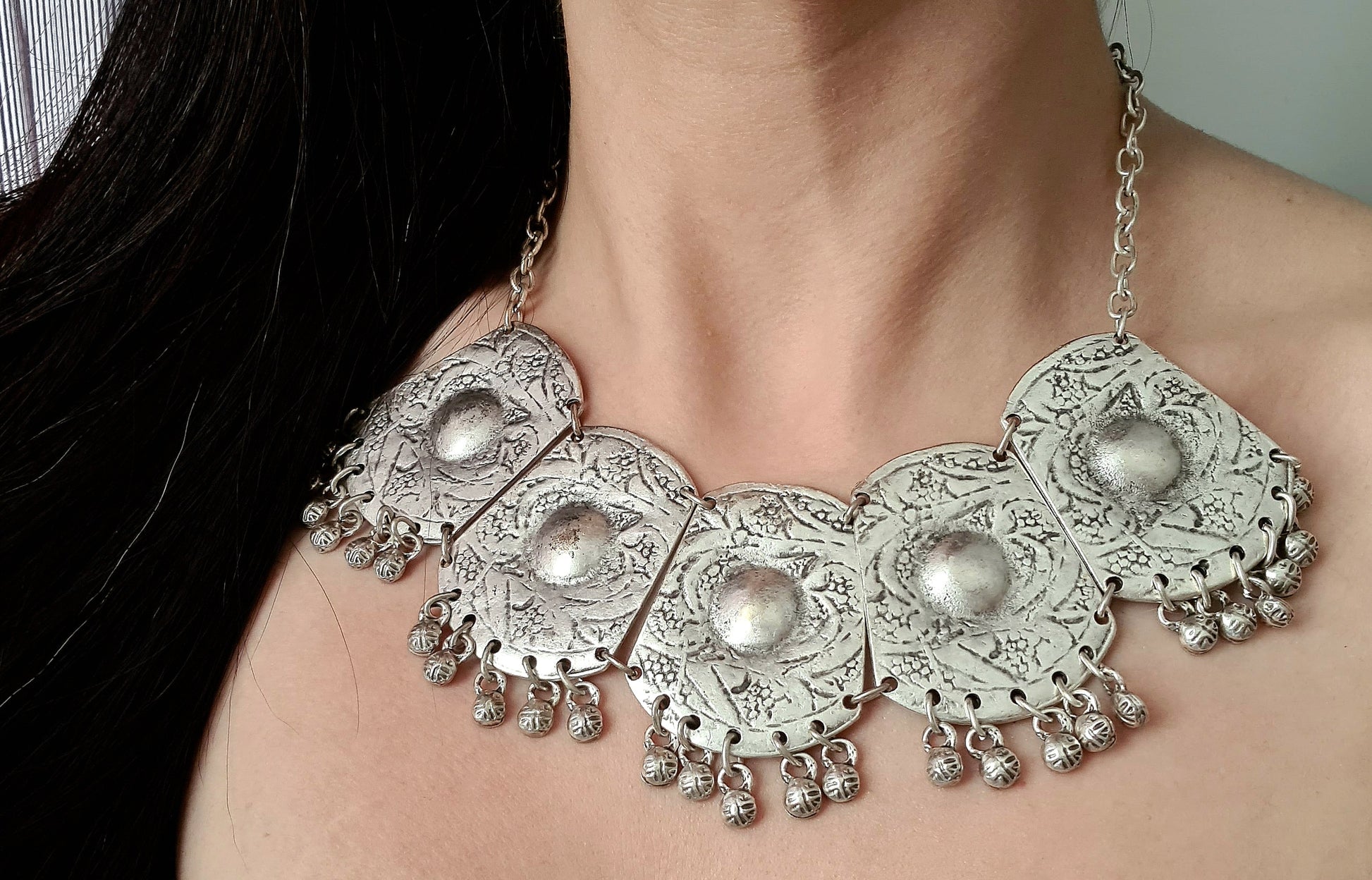 Dazzling silver filigree necklace, "Anastasia," features mesmerizing details,