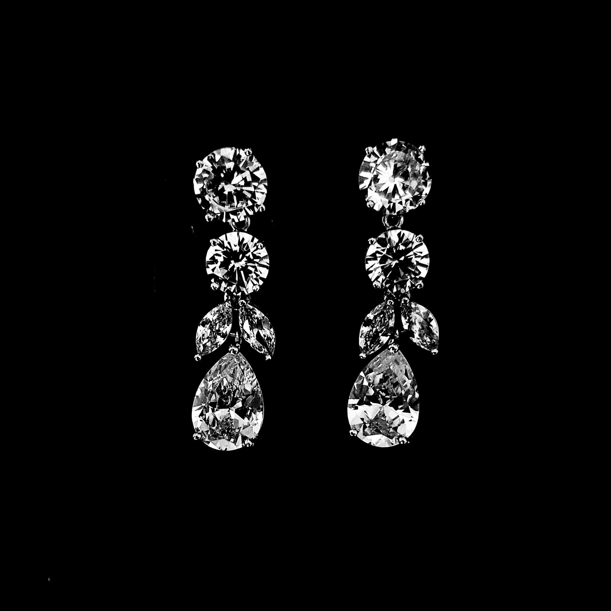 Celena Earrings cubic zirconia stones waterdrop shapes earrings, crafted in classic silver
