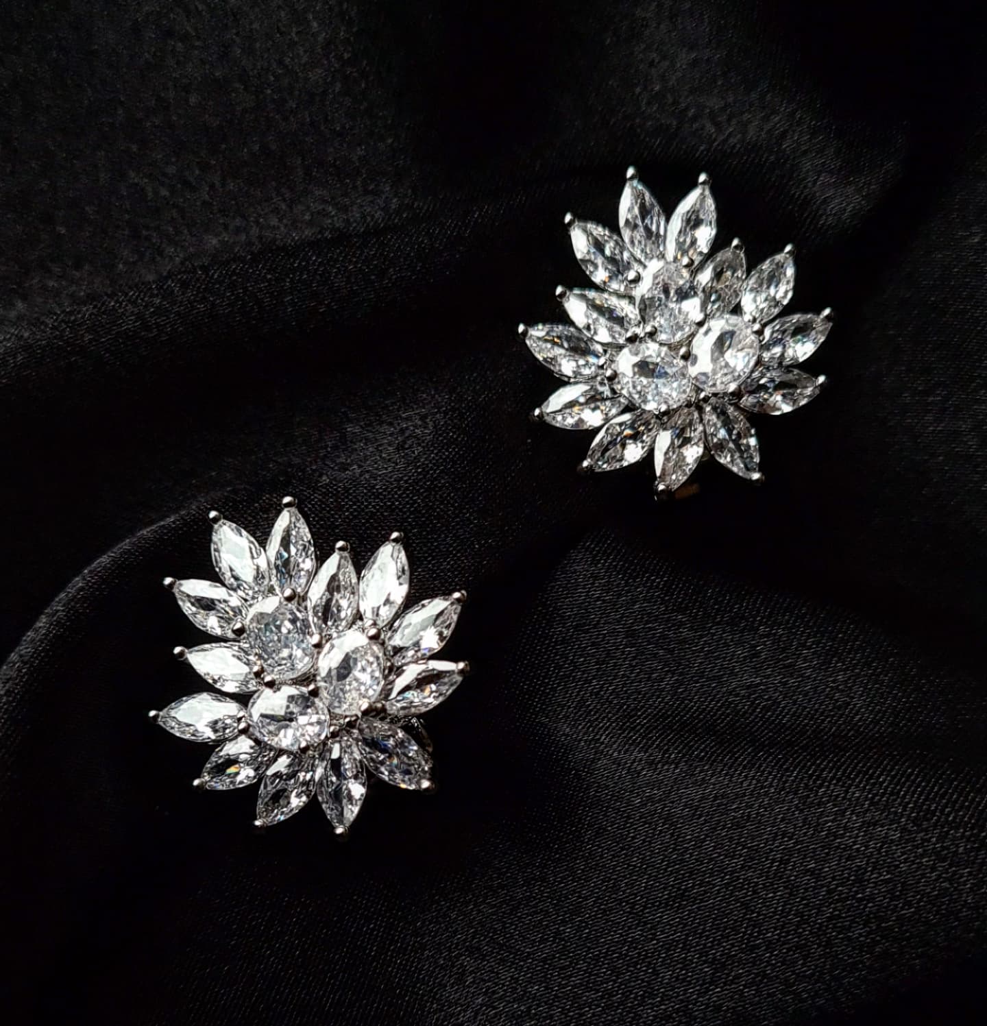 Cathy Earrings featuring exquisite cubic zirconia stones set in gleaming silver.