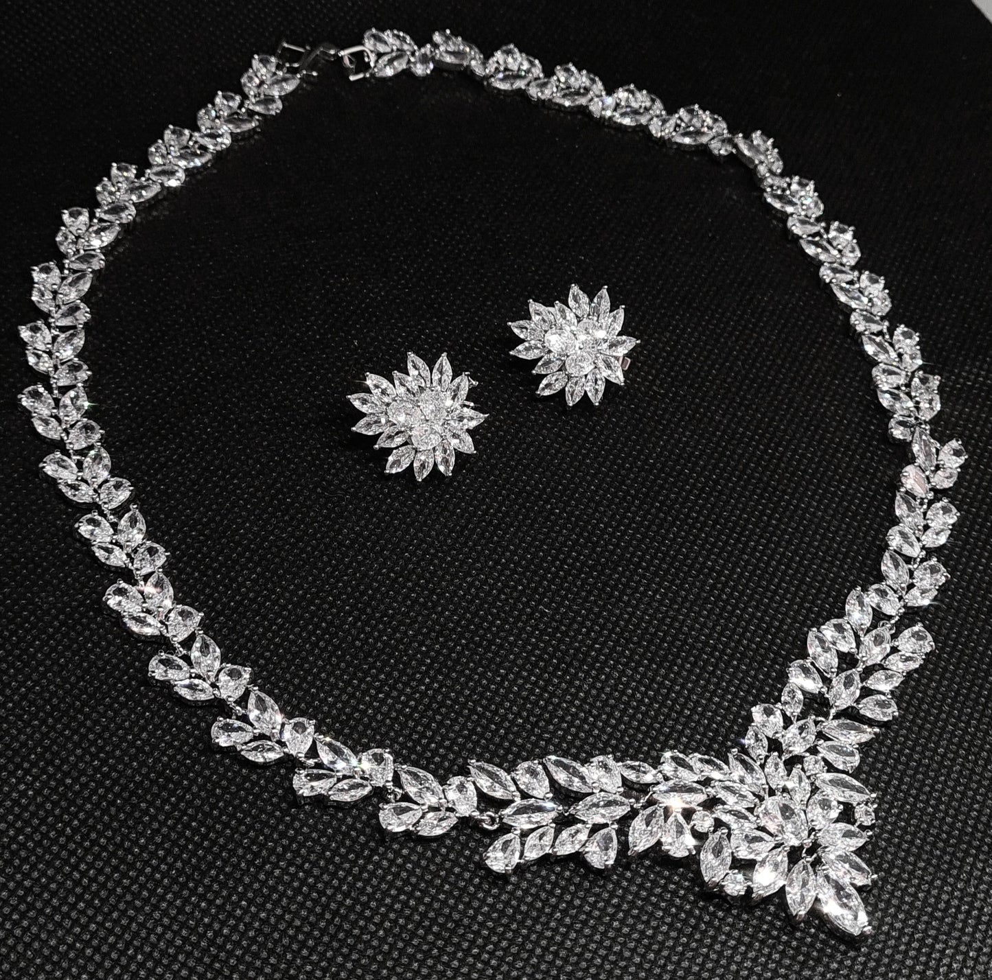 Anne Marie necklace with intricate floral design and sparkling cubic zirconia stones.