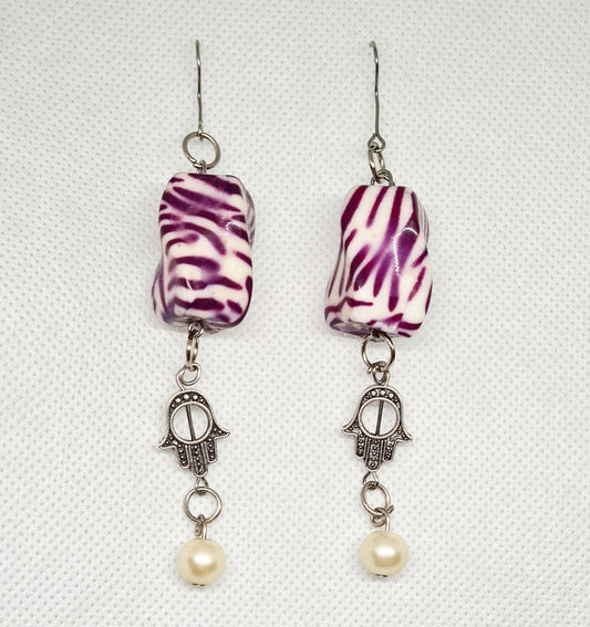 Bella Earrings a delicate dangle drop design with a captivating Hamsa charm.