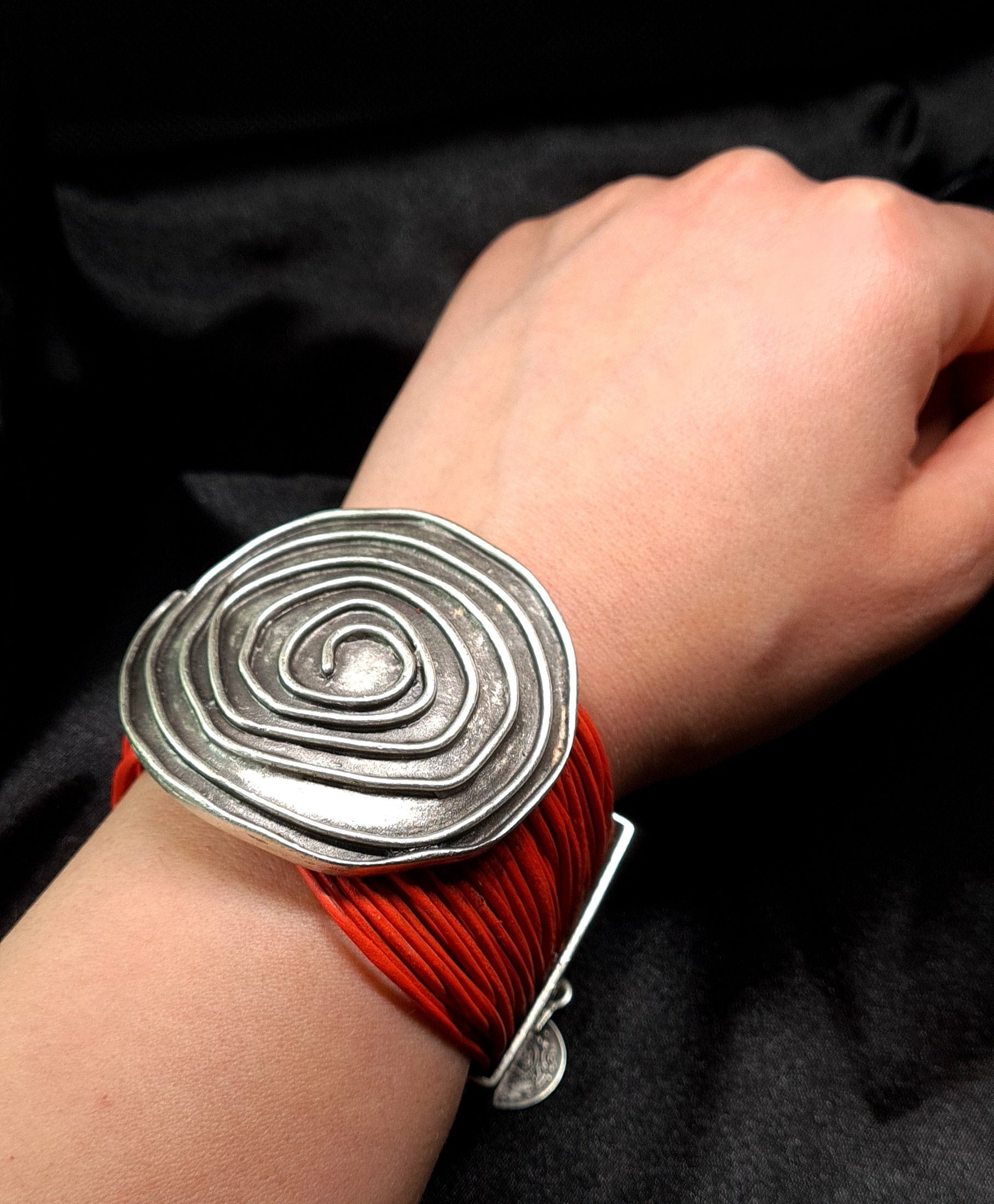 Brigitta Bracelet a silver bracelet with red leather straps