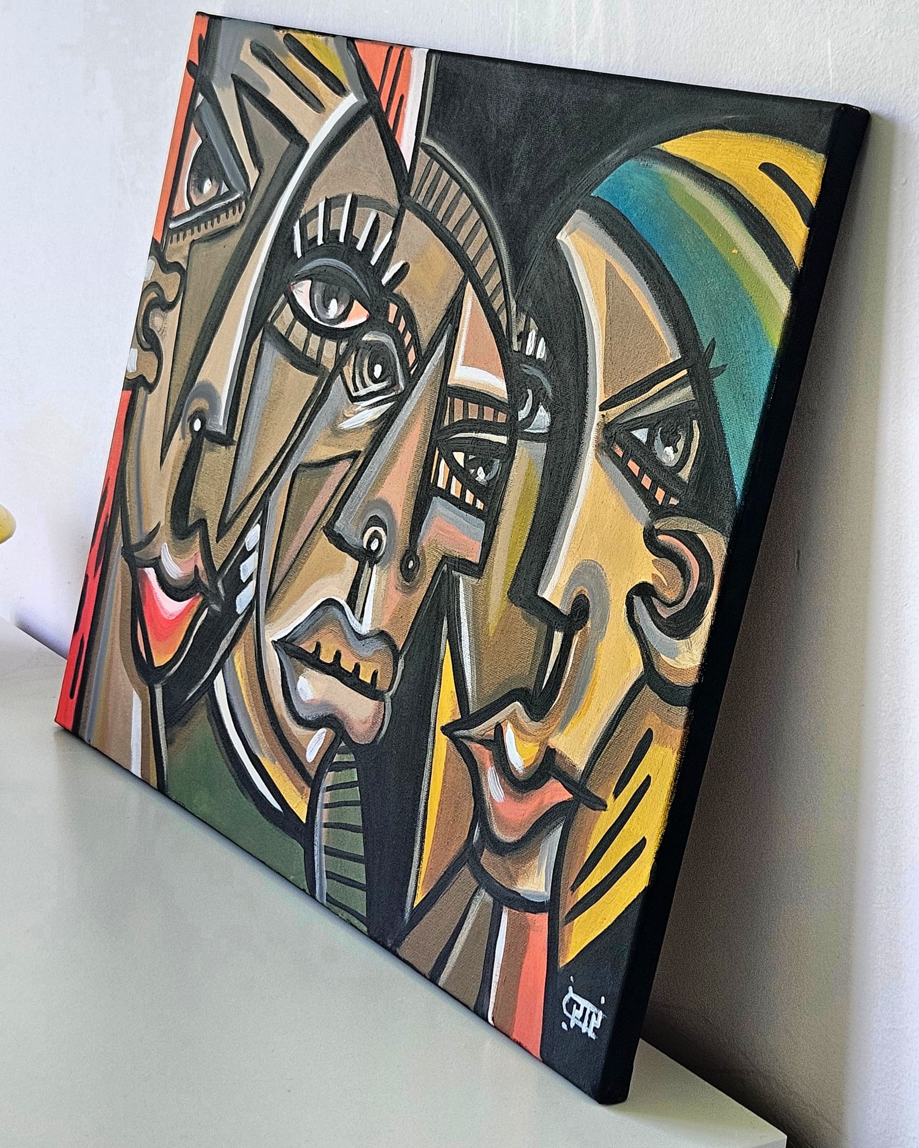 Abstract painting titled Trio of Devious Gazes featuring interwoven, stylized faces with bold black outlines and earthy tones.