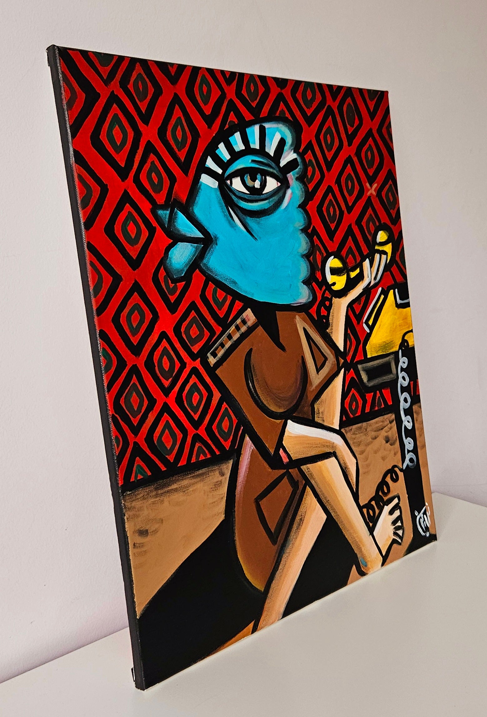 Abstract painting of a masked figure with a telephone, set against a bold red background with geometric patterns.