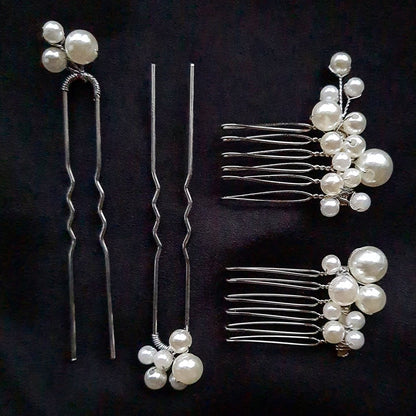 a bunch of hair pins with pearls on them. The hair pins are made of metal and have pearls of different sizes on them. The hair pins are in white color.